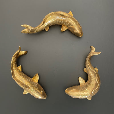 3 gold fish wall decorations