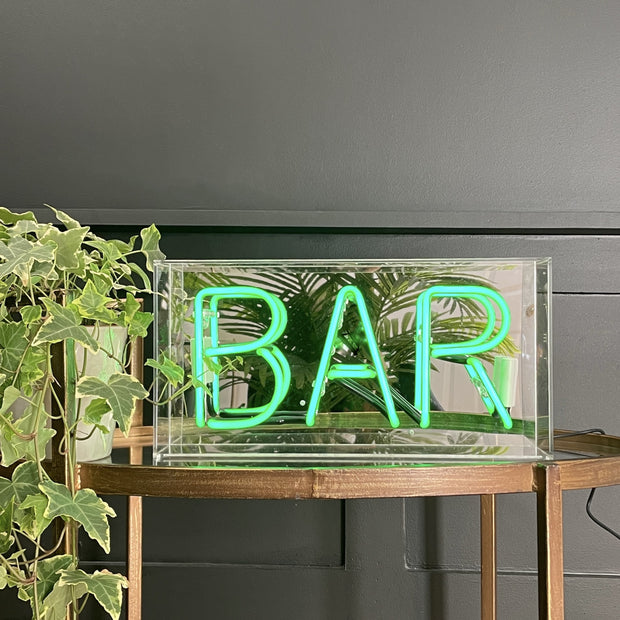 Green neon bar sign box with a mirrored back