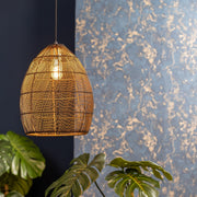 Black & gold wire shade ceiling light with a black chain lit