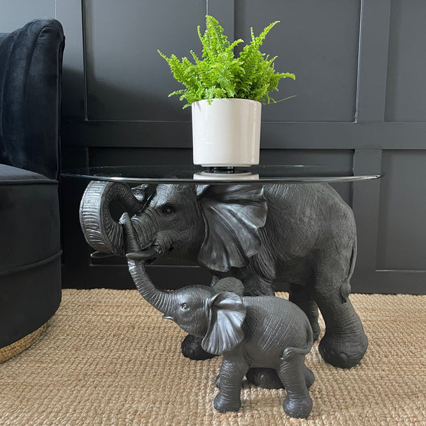 Mum & child black elephant side table with a round glass top