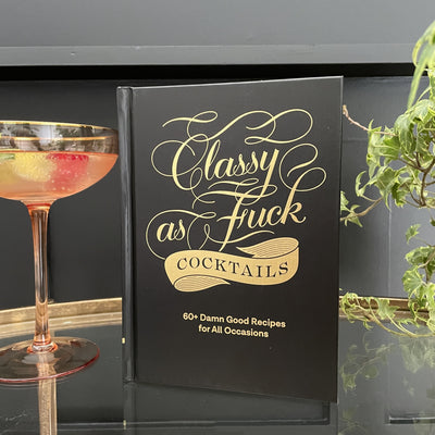 Black classy as fuck cocktail book with gold edging