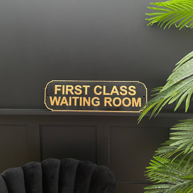 Black & gold metal first class wall sign