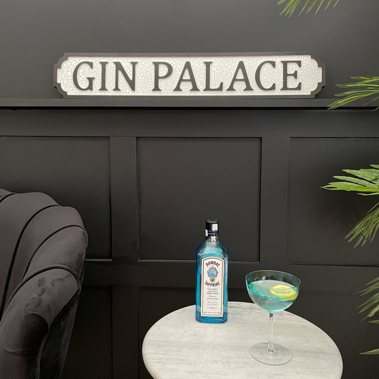 Black & white wooden gin palace sign