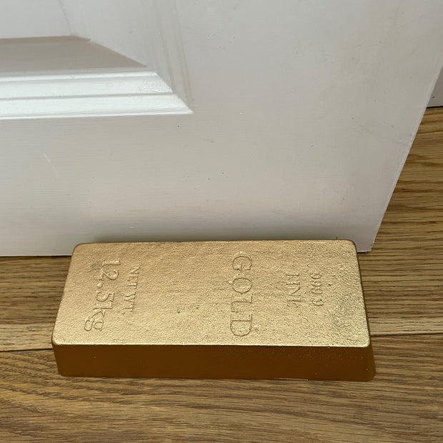 Bar of gold weighted doorstop