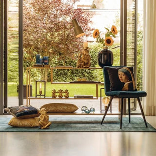 Freestanding gold console table with staggered geometric clear glass shelves 