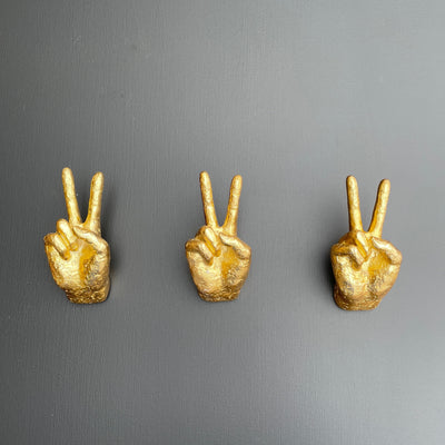 Gold peace wall hook