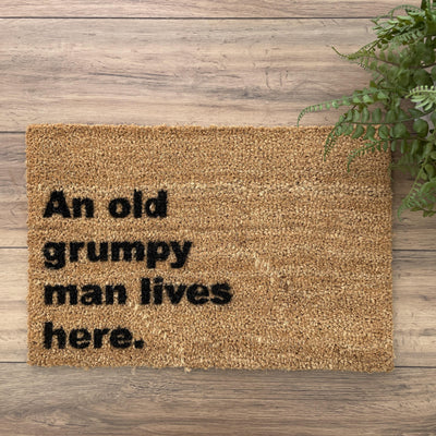 An old grumpy man lives here doormat