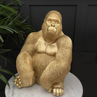 Large gold gorilla sitting ornament 