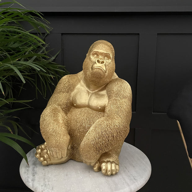 Large gold gorilla sitting ornament 