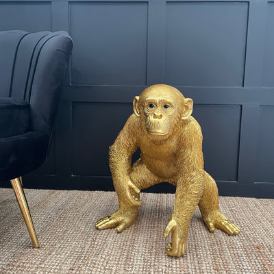 Large gold monkey floor ornament