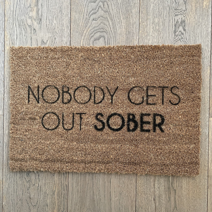 Nobody gets out sober doormat