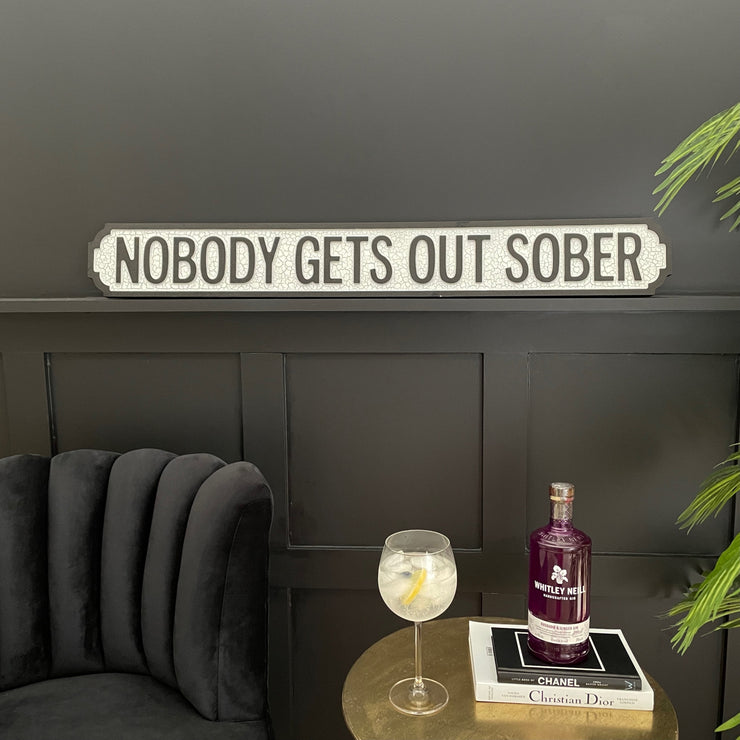 Nobody gets out sober rectangular white & black wooden sign