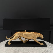Gold panther table lamp with a black lampshade