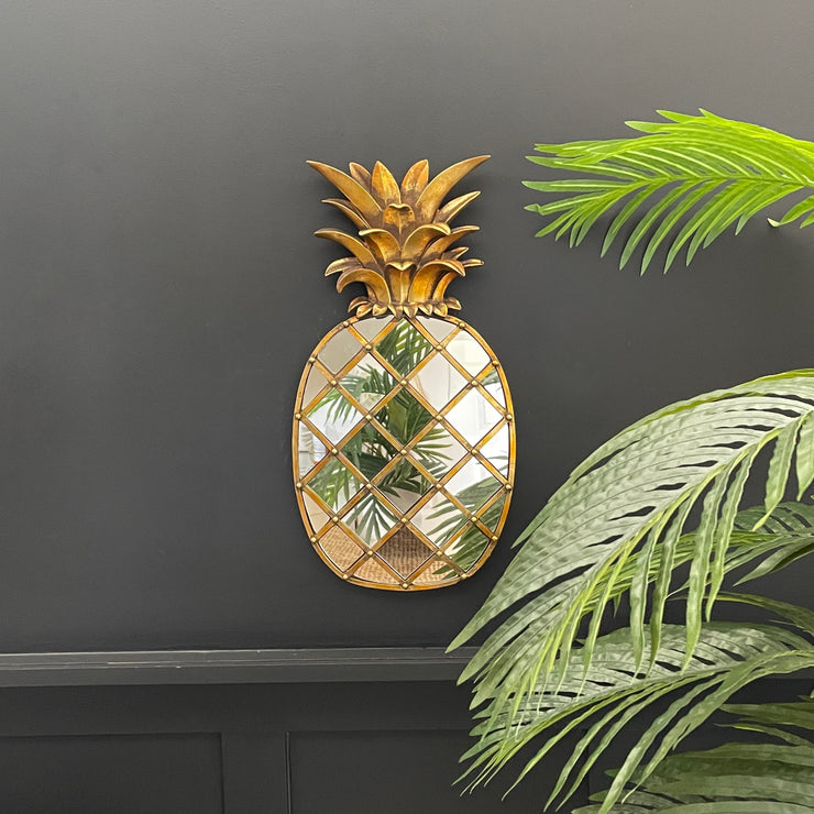 Gold pineapple asymmetric wall mirror 