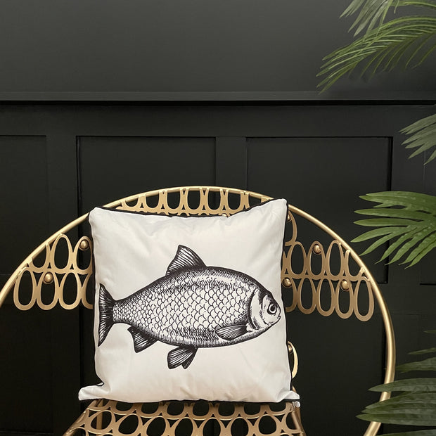 White square outdoor fish cushion with black piping