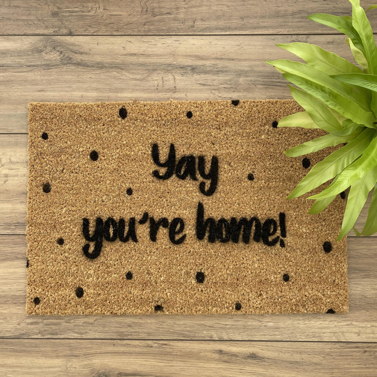 Spotty doormat with yay you're home on the front