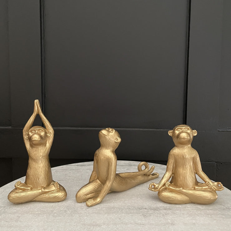 Set of three gold yoga monkeys